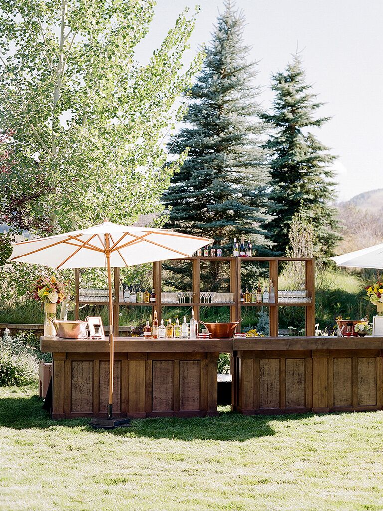 The bar is a spot that most of your guests will visit a few times throughout the night, which is precisely why it's a great place to add a burst of color or personalized décor element.